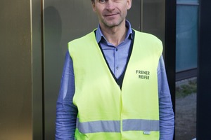  Markus Überbacher, technical manager at Frener &amp; Reifer, in front of the mock-up of the facade portal. 